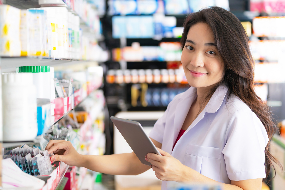 Asian female pharmacist in the pharmacy